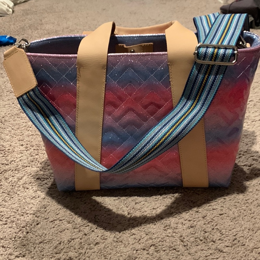 Consuela tote style bag with leather handles and removable cross body strap